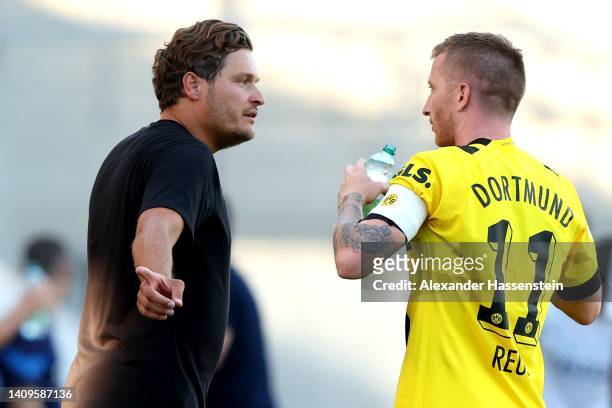 Marco Reus of Dortmund talks to his head coach Edin Terzic during the Pre-Season friendly match between Borussia Dortmund and Valencia CF at Stadion...