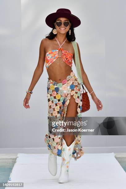 Model walks the runway wearing Mamie Ruth with VOLTA ATELIER handbags during Flying Solo Miami Swim Week 2022 on July 18, 2022 in Miami Beach,...