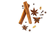 spice isolate. a set of spices for mulled wine. anise, cinnamon and cloves on a white table. spices for making a winter drink on a white background