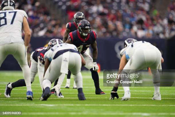 Neville Hewitt of the Houston Texans gets set against the Tennessee Titans during an NFL game at NRG Stadium on January 09, 2022 in Houston, Texas.