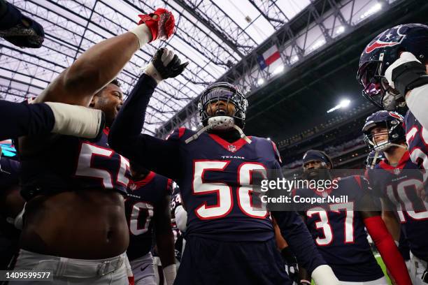 Christian Kirksey of the Houston Texans leads the pregame huddle against the Tennessee Titans prior to an NFL game at NRG Stadium on January 09, 2022...