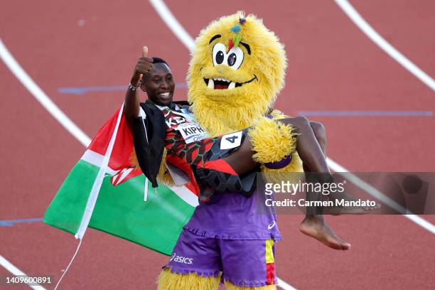 Conseslus Kipruto of Team Kenya is carried by mascot, Legend, after winning bronze the Men's 3000m Steeplechase Fina on day four of the World...
