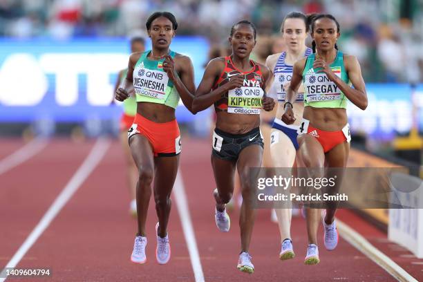Hirut Meshesha of Team Ethiopia, Faith Kipyegon of Team Kenya and Gudaf Tsegay of Team Ethiopia compete in the Women's 1500m Final on day four of the...