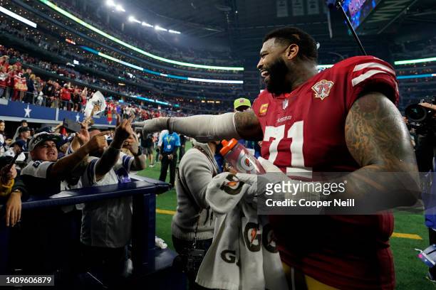 Trent Williams of the San Francisco 49ers celebrates against the Dallas Cowboys after an NFL wild-card playoff football game at AT&T Stadium on...