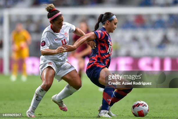 Desiree Scott of Canada fights for the ball with Sophia Smith of USA during the championship match between United States and Canada as part of the...