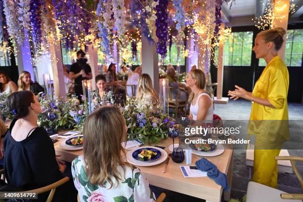 Goop Founder, Gwyneth Paltrow greets guests at A Dreamy Evening with Goopglow on July 18, 2022 in East Hampton City.