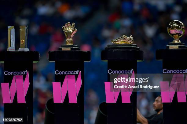 Trophies for young player, best goalkeeper, top scorer and best player are displayed after the championship match between United States and Canada as...