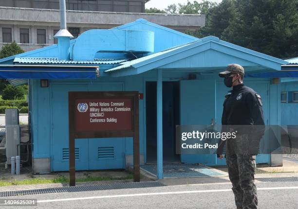 South Korean stands guard in the truce village of Panmunjom inside the demilitarized zone separating the South and North Korea on July 19, 2022 in...