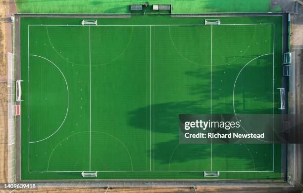 hockey field - hockey background stockfoto's en -beelden