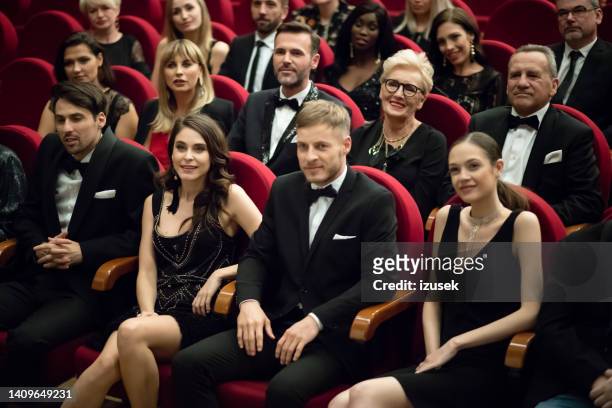 happy audience sitting in opera house - theater gala stock pictures, royalty-free photos & images