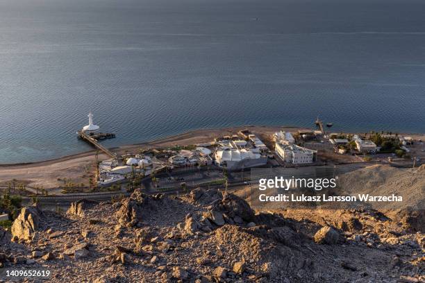 Sunrise over the Gulf of Aqaba on July 18 in Eilat, Israel. The Underwater Observatory Marine Park in Eilat with its easily recognisable tower and...