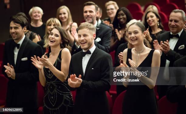 standing ovation in theatre - gala stock pictures, royalty-free photos & images