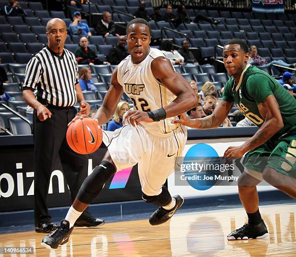 Isaiah Sykes of the UCF Knights drives against Jekore Tyler of the UAB Blazers during the Quarterfinals of the 2012 CUSA men's basketball tournament...
