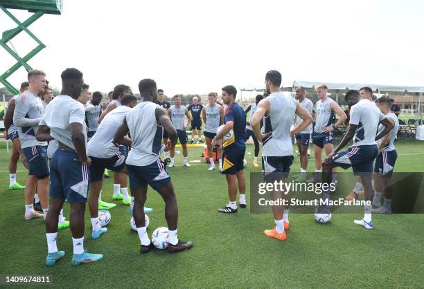 Arsenal manager Mikel Arteta talks to his players during a training session at the Omni Resort on July 19, 2022 in Orlando, Florida.