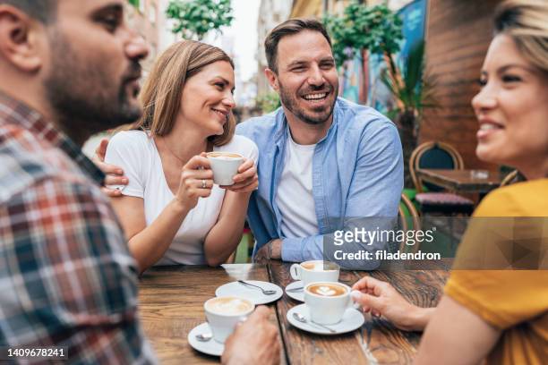 coffee with friends - boyfriend stock pictures, royalty-free photos & images