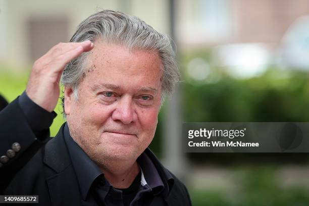 Former White House Chief Strategist Steve Bannon salutes while arriving at the U.S. District Courthouse for his trial for contempt of Congress, on...