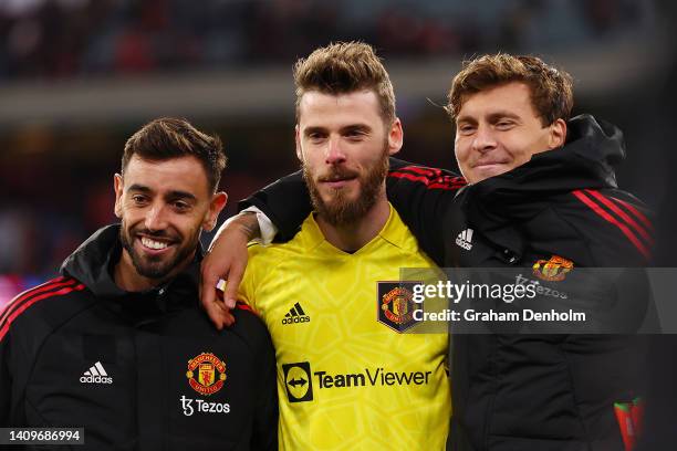 Bruno Fernandes, David De Gea and Victor Lindelof of Manchester United pose following the Pre-Season Friendly match between Manchester United and...