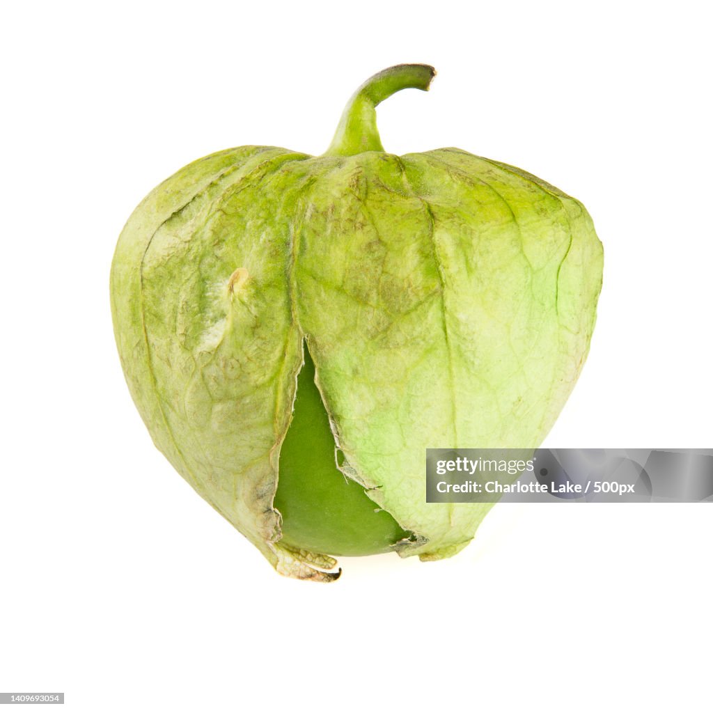 Close-up of fruit against white background