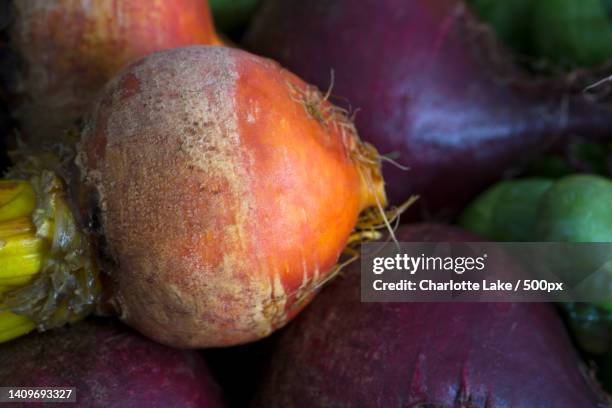close-up of potatoes for sale at market - winter vegetables foto e immagini stock
