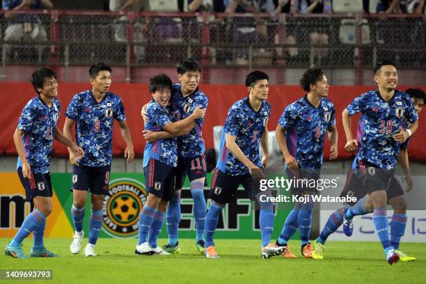 Yuki Soma of Japan celebrates scoring his side's first goal during the EAFF E-1 Football Championship match between Japan and Hong Kong at Kashima...