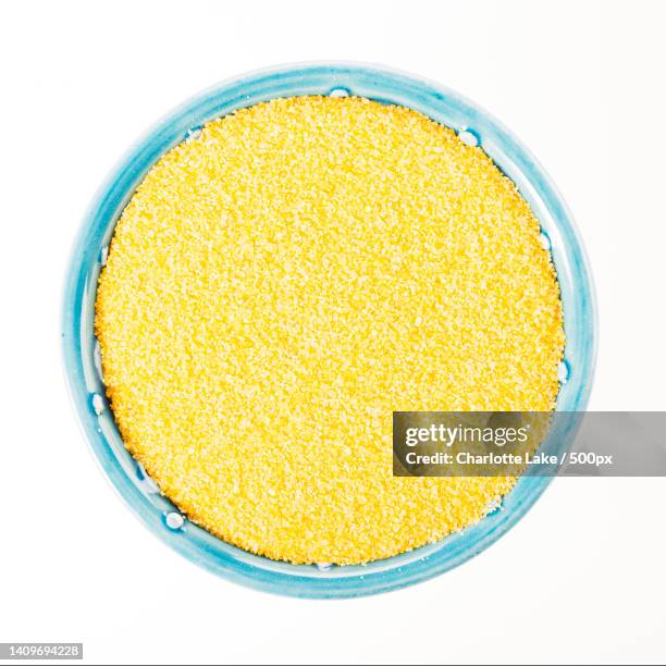 directly above shot of food in bowl on white background - farinha de milho imagens e fotografias de stock