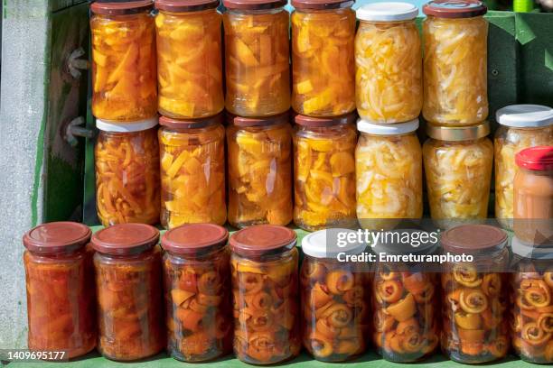 fruit jams in glass jars on a market stall in ildir. - emreturanphoto stock pictures, royalty-free photos & images