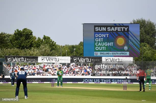 View of the big screen displaying a message urging spectators to be aware of sun safety during the 1st Royal London Series One Day International...