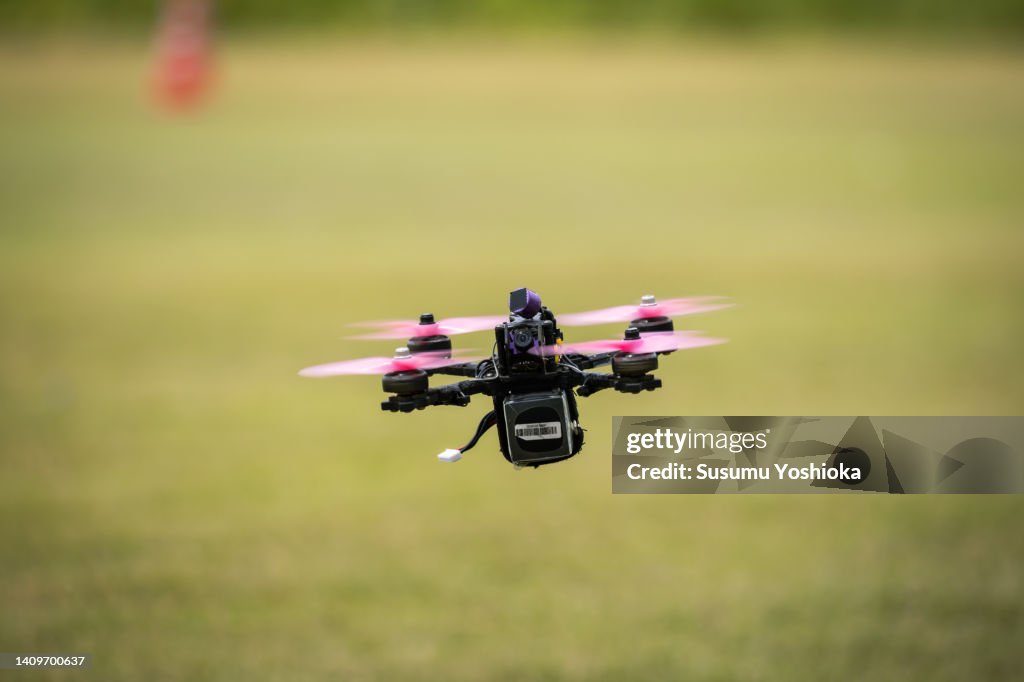 A day when friends gathered at a practice field to practice racing drones.