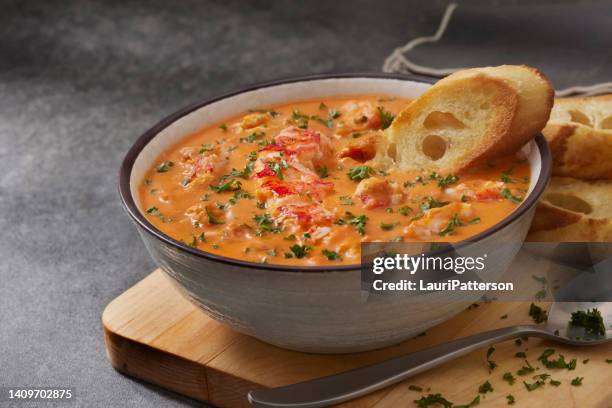 lobster bisque - soup vegtables stockfoto's en -beelden