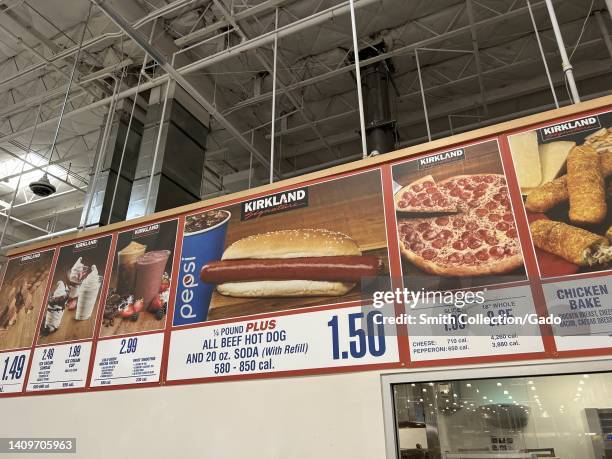 Close-up of signs listing prices at Costco food court, including the price for Costco's hot dog and fountain soda combination, Danville, California,...