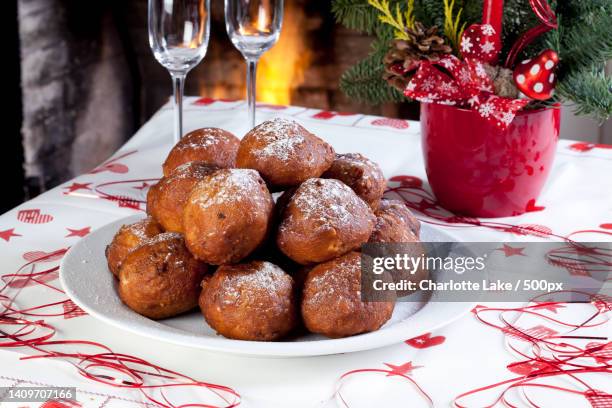 close-up of dessert in plate on table - oliebollen stock pictures, royalty-free photos & images