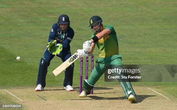 South Africa batsman Aiden Markram hits out watched by Jos Buttler during the First Royal London ODI match between England and South Africa at...