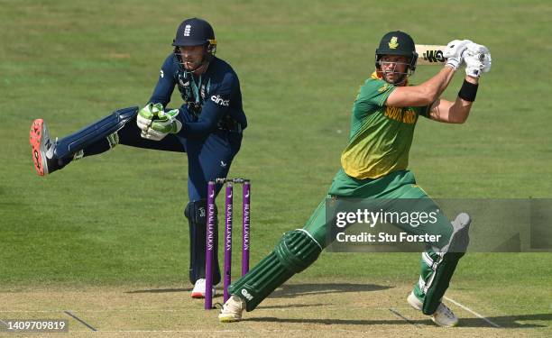 South Africa batsman Aiden Markram hits out watched by Jos Buttler during the First Royal London ODI match between England and South Africa at...