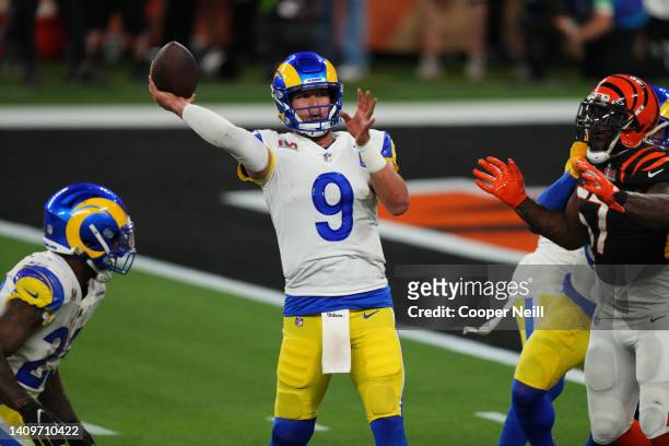 Matthew Stafford of the Los Angeles Rams throws the touchdown pass to gain the lead 23-20 during to the NFL Super Bowl LVI football game against the...