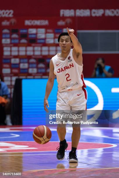 Yuki Togashi of Japan controls the ball during the FIBA Asia Cup qualification for the quarter-final game between Japan and Philippines at Istora...