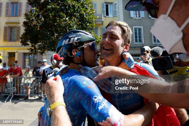 Stage winner Hugo Houle of Canada and Team Israel - Premier Tech celebrates at finish line as stage winner with his teammate Michael Woods of Canada...