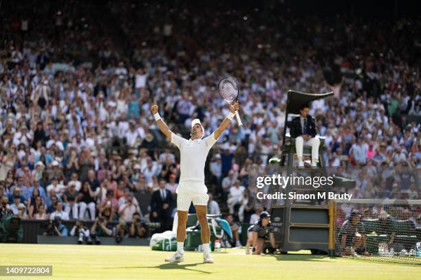 Novak Djokovic of Serbia celebrates after winning the Mens Singles Final against Nick Kyrgios of Australia at The Wimbledon Lawn Tennis Championship...