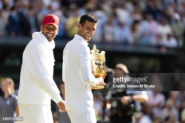 Novak Djokovic of Serbia with the trophy after victory in the Mens Singles Final against Nick Kyrgios of Australia at The Wimbledon Lawn Tennis...