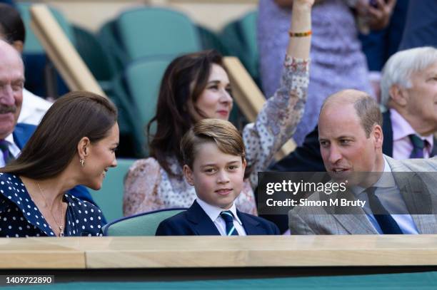 Prince William, Duke of Cambridge and The Duchess of Cambridge with there son Prince George in the royal box at the Mens Singles Final at The...