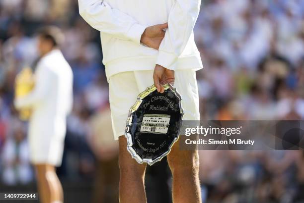 Nick Kyrgios of Australia holds the the runner up trophy after loosing in the Mens Singles Final against Novak Djokovic of Serbia at The Wimbledon...