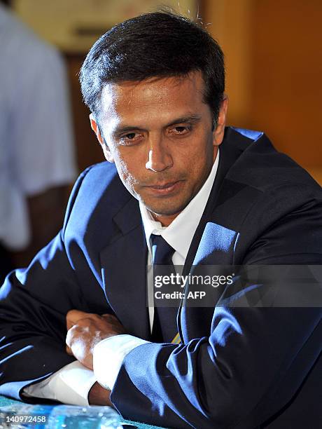 Indian cricketer Rahul Dravid looks on while addressing a press conference held to announce his retirement from Test cricket in Bangalore on March 9,...