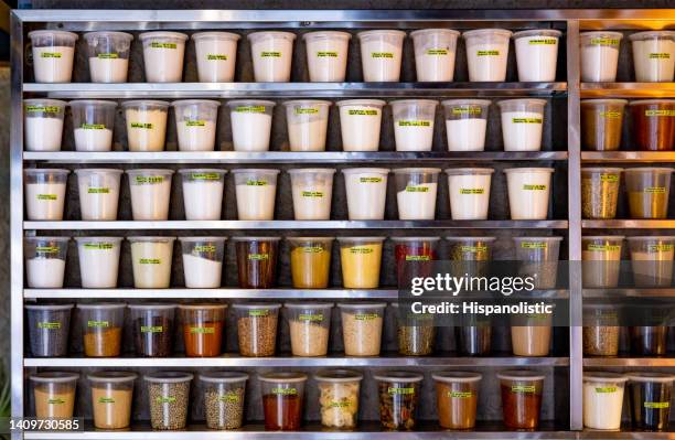 pantry of spices in a commercial kitchen at a restaurant - voorraadkast stockfoto's en -beelden