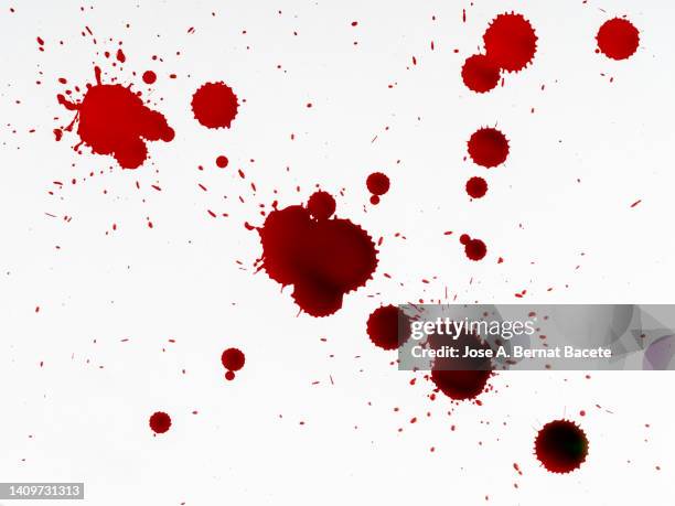 drop of blood on slides on a white surface. - blood fotografías e imágenes de stock