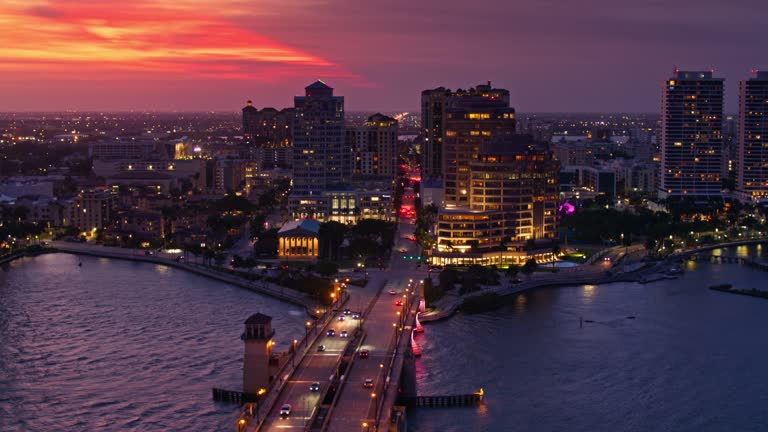https://media.gettyimages.com/id/1409732255/video/downtown-west-palm-beach-florida-at-sunset-aerial-view.jpg?b=1&s=640x640&k=20&c=csEWLLrd3e49Z4srX9saB9nccbrImD5WJe1Jifw3lXc=