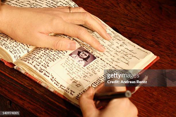 Detail of the diary of the wax figure of Anne Frank and their hideout reconstruction is unveiled at Madame Tussauds on March 9, 2012 in Berlin,...
