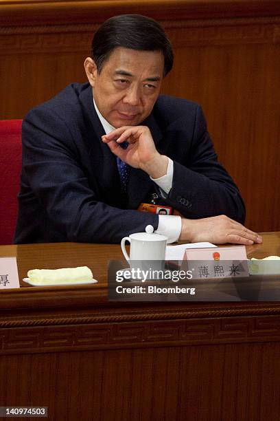 Bo Xilai, Chinese Communist Party secretary of Chongqing, attends a plenary session on the work report of the National People's Congress as China's...