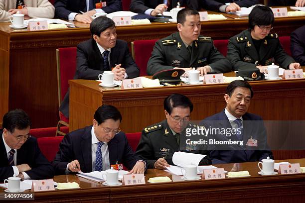 Wang Yang, Chinese Communist Party secretary of Guangdong Province, left, Zhang Dejiang, vice premier of China, second from left, Xu Caihou, vice...