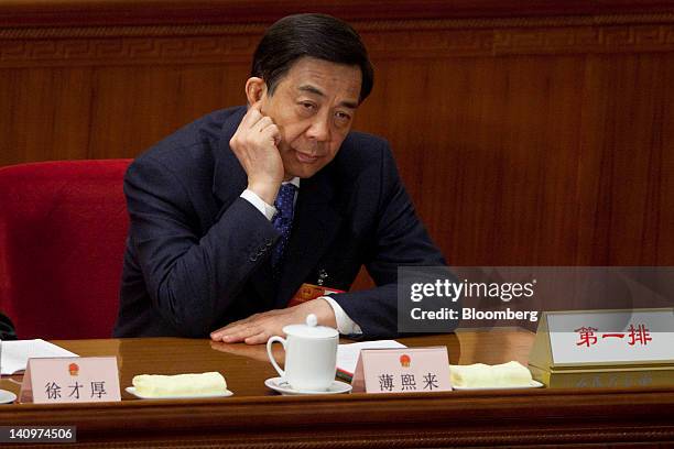 Bo Xilai, Chinese Communist Party secretary of Chongqing, attends a plenary session on the work report of the National People's Congress as China's...