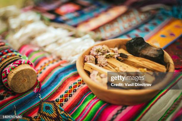 paolo santo tree in a wooden bowl. - smudging ceremony stock pictures, royalty-free photos & images