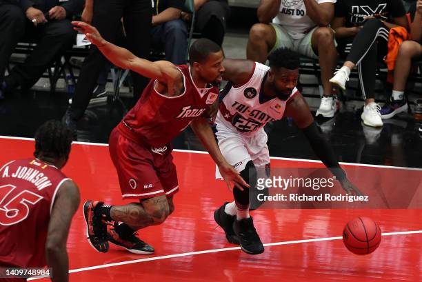 Isaiah Briscoe of Trilogy guards Justin Dentmon of Tri-State in a week 5 BIG3 basketball game at Comerica Center on July 17, 2022 in Frisco, Texas.